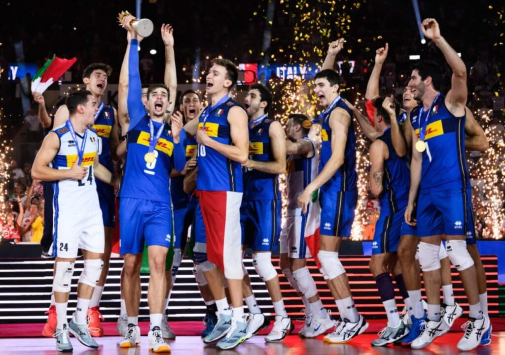 Italian volleyball team holding the 2022 World Championship trophy.