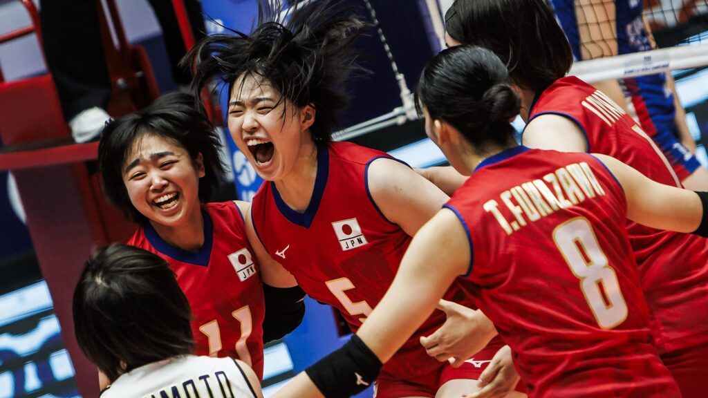 Japan's Amika Saiki explodes in joy after scoring the game-winning point against Serbia